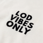 חולצת Lod Vibes Only אוברסייז בצבע שמנת