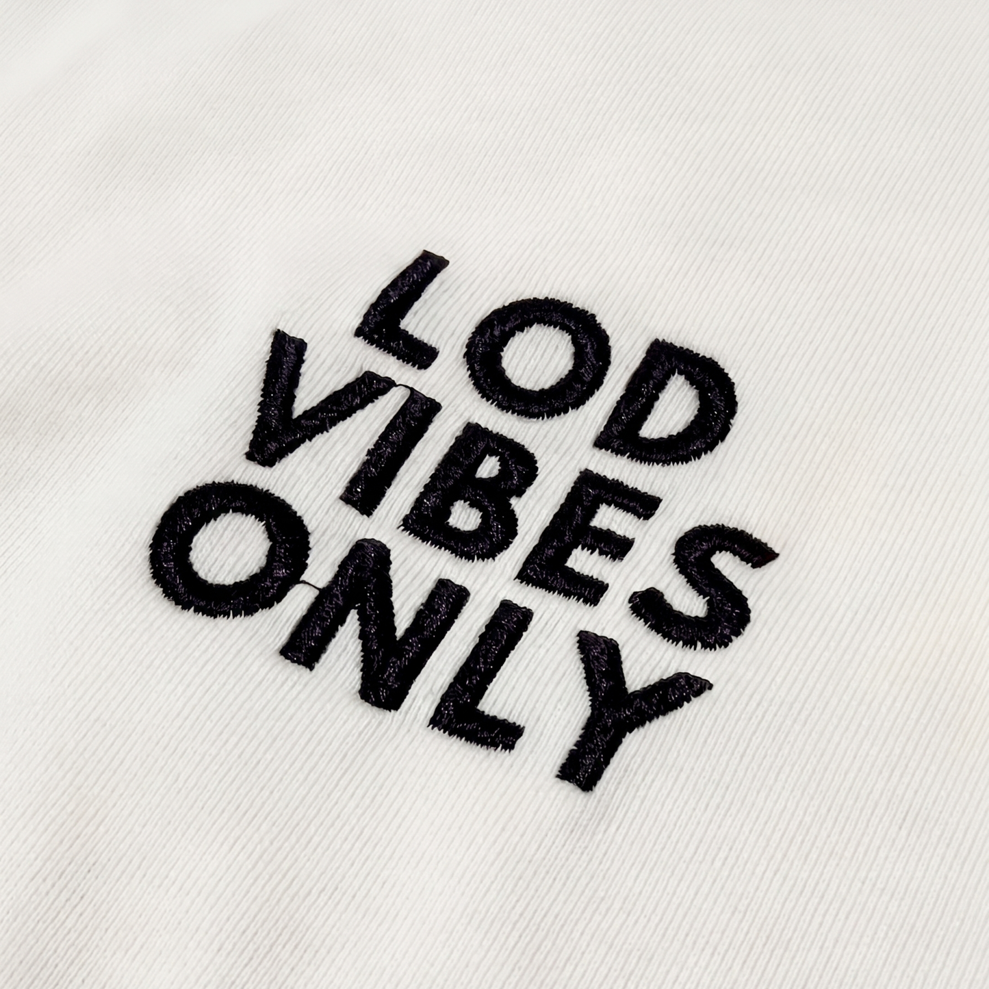 חולצת Lod Vibes Only אוברסייז בצבע שמנת